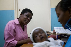 Community Health Workers Working with HIV-infected Mothers, photo credit USAID