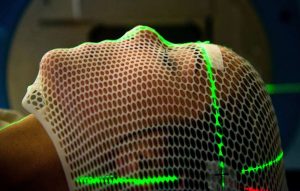 A patient is prepared for radiation treatment